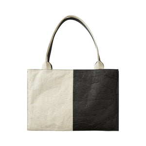 Pineapple leather two-toned black and white flat tote bag.